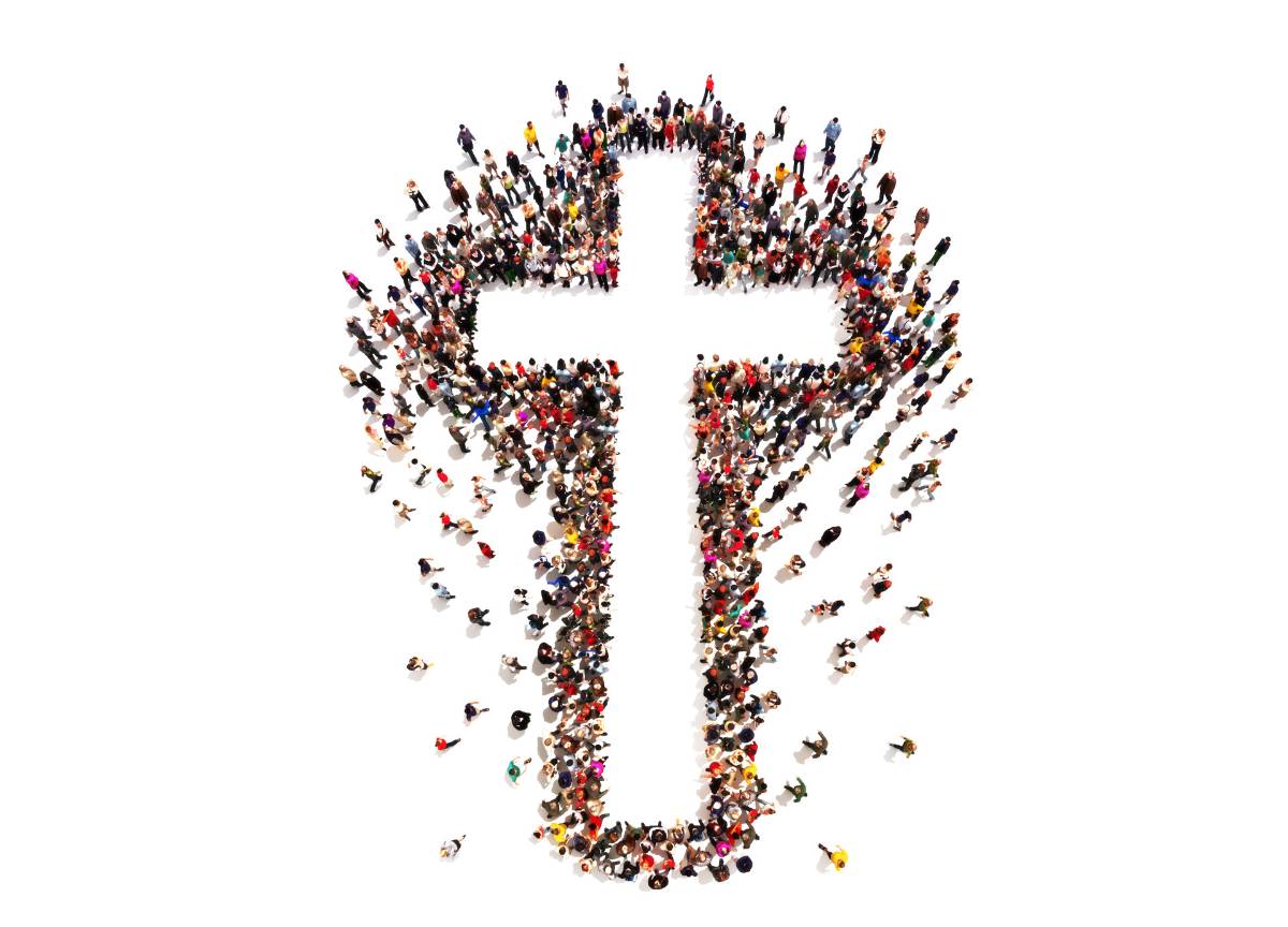 Menschen bilden ein Kreuz